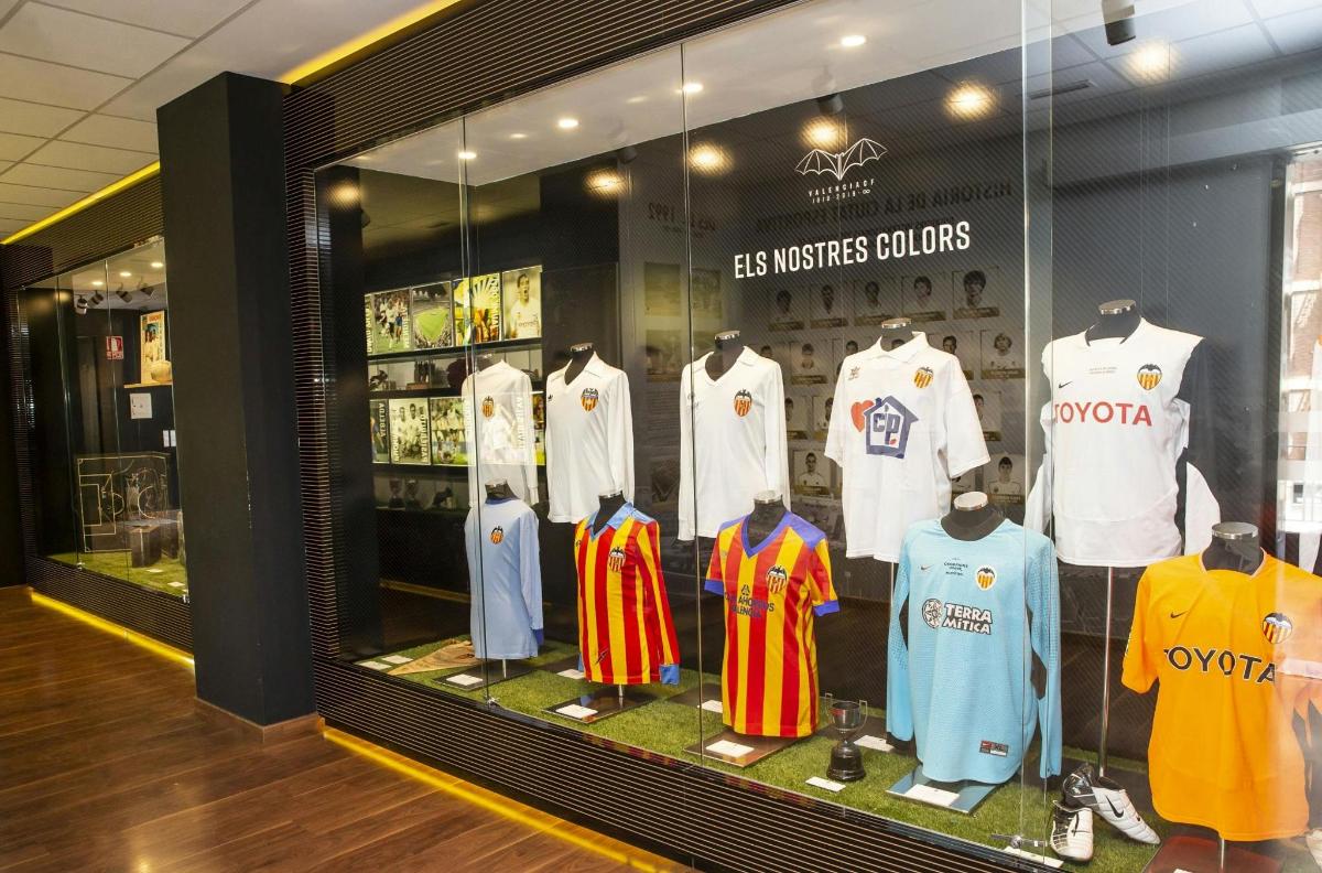 a display window of a soccer shop with jerseys
