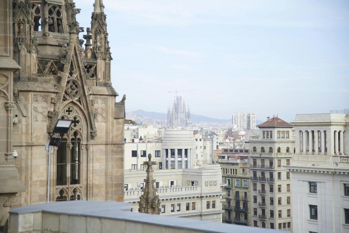 a view of a cathedral and some buildings