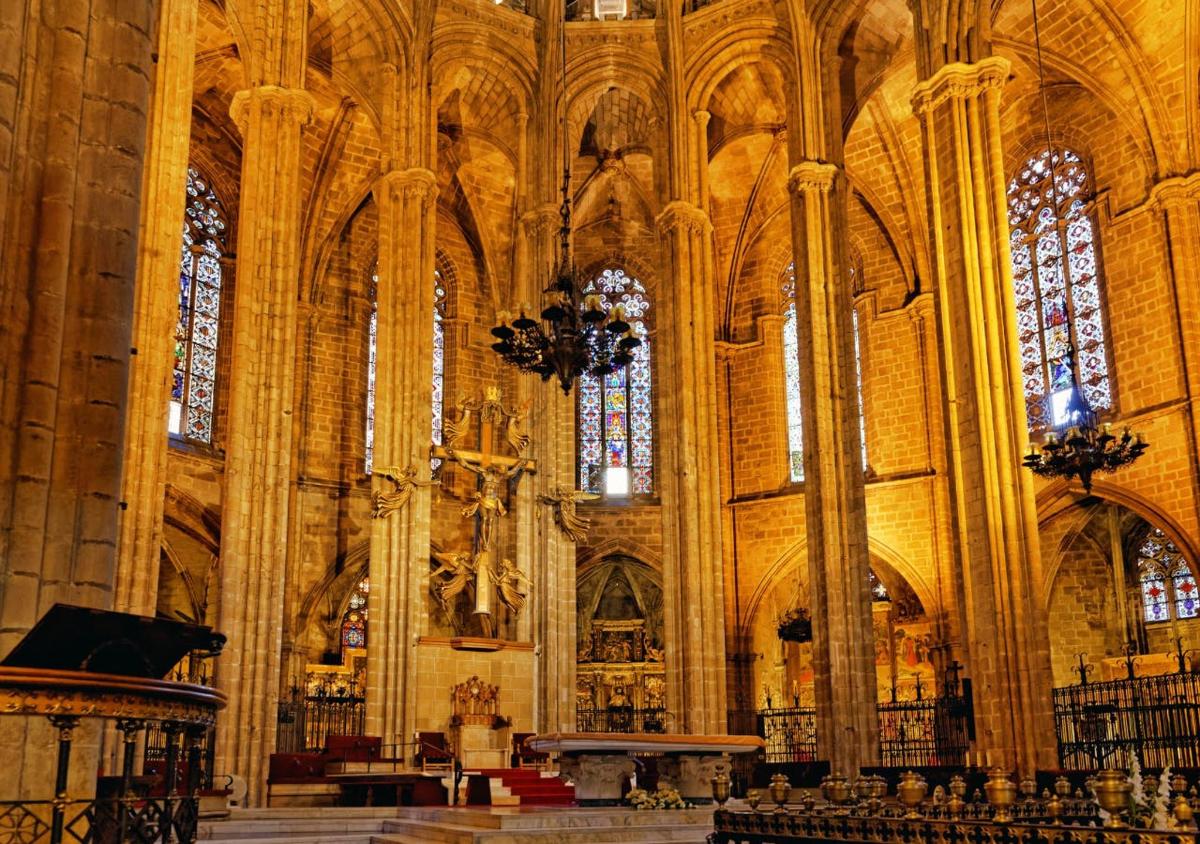 a large cathedral with tall ceilings and stained glass windows