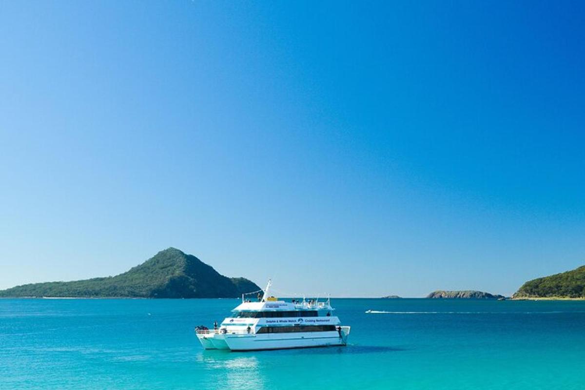 a boat in the middle of a large body of water