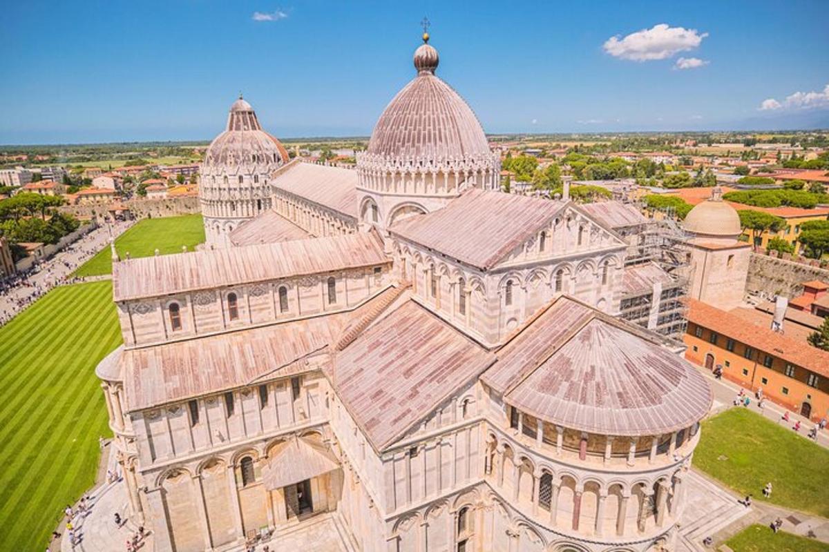 an aerial view of a large building with domes