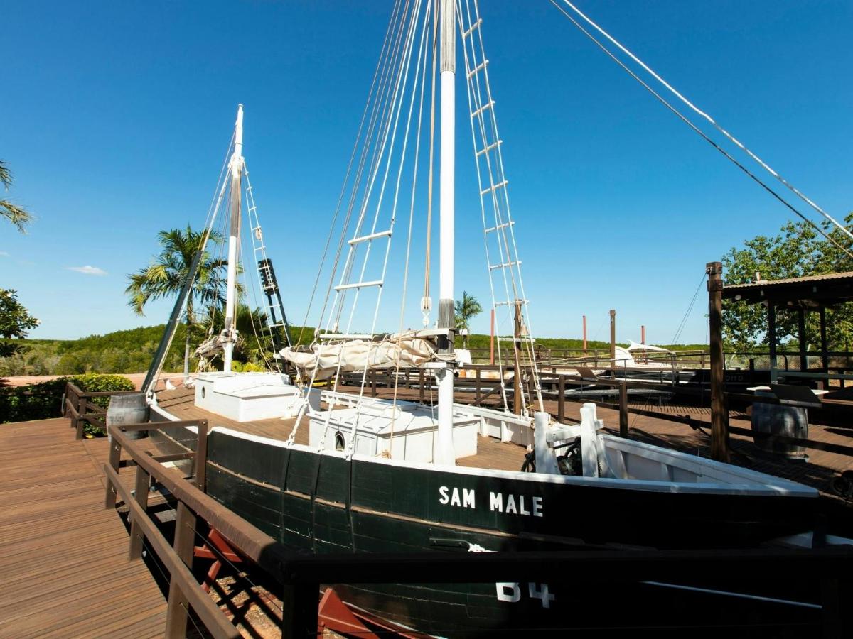 a boat is docked next to a dock