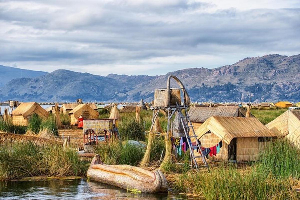 a group of huts and a playground in the water
