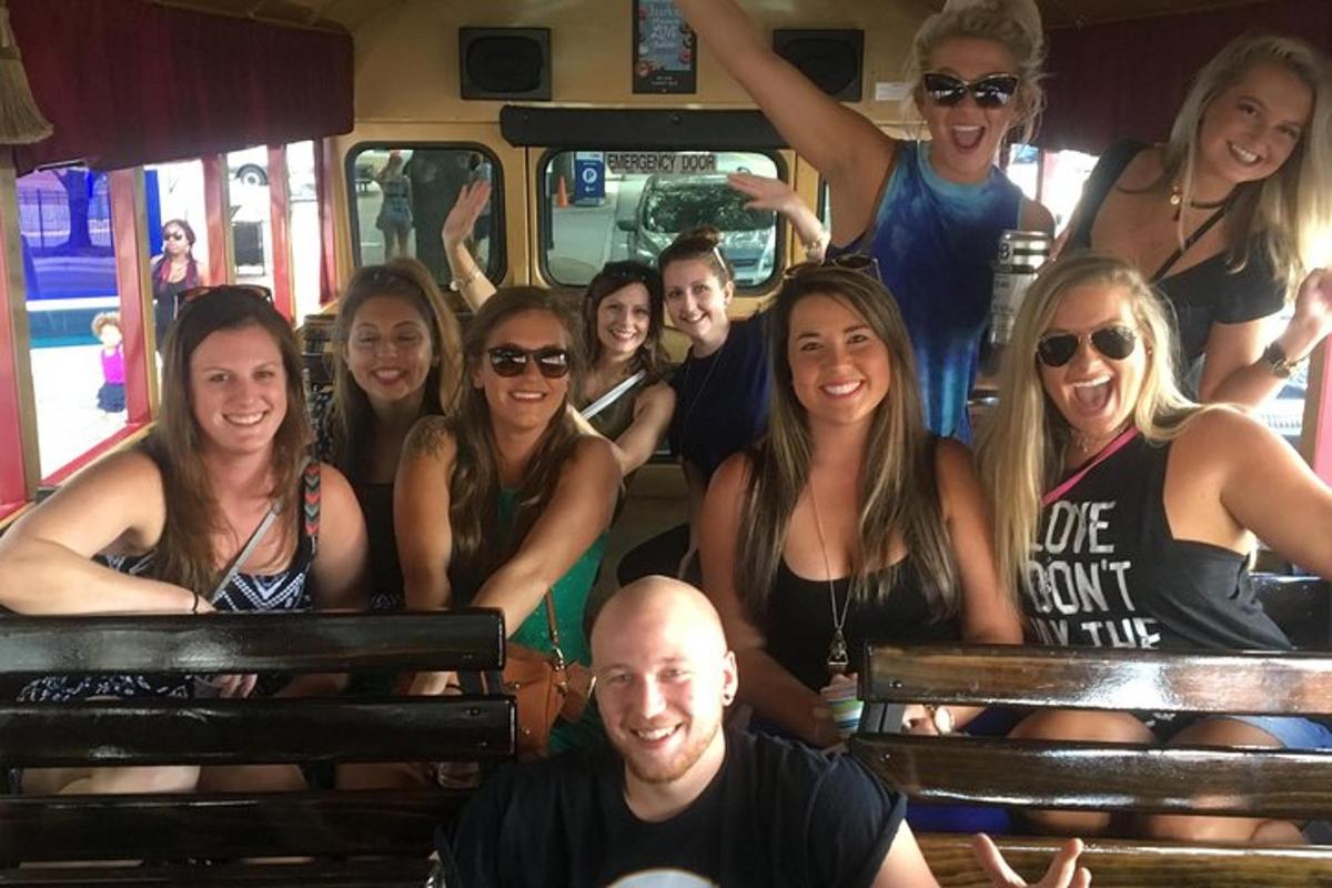 a group of people posing for a picture in a bus