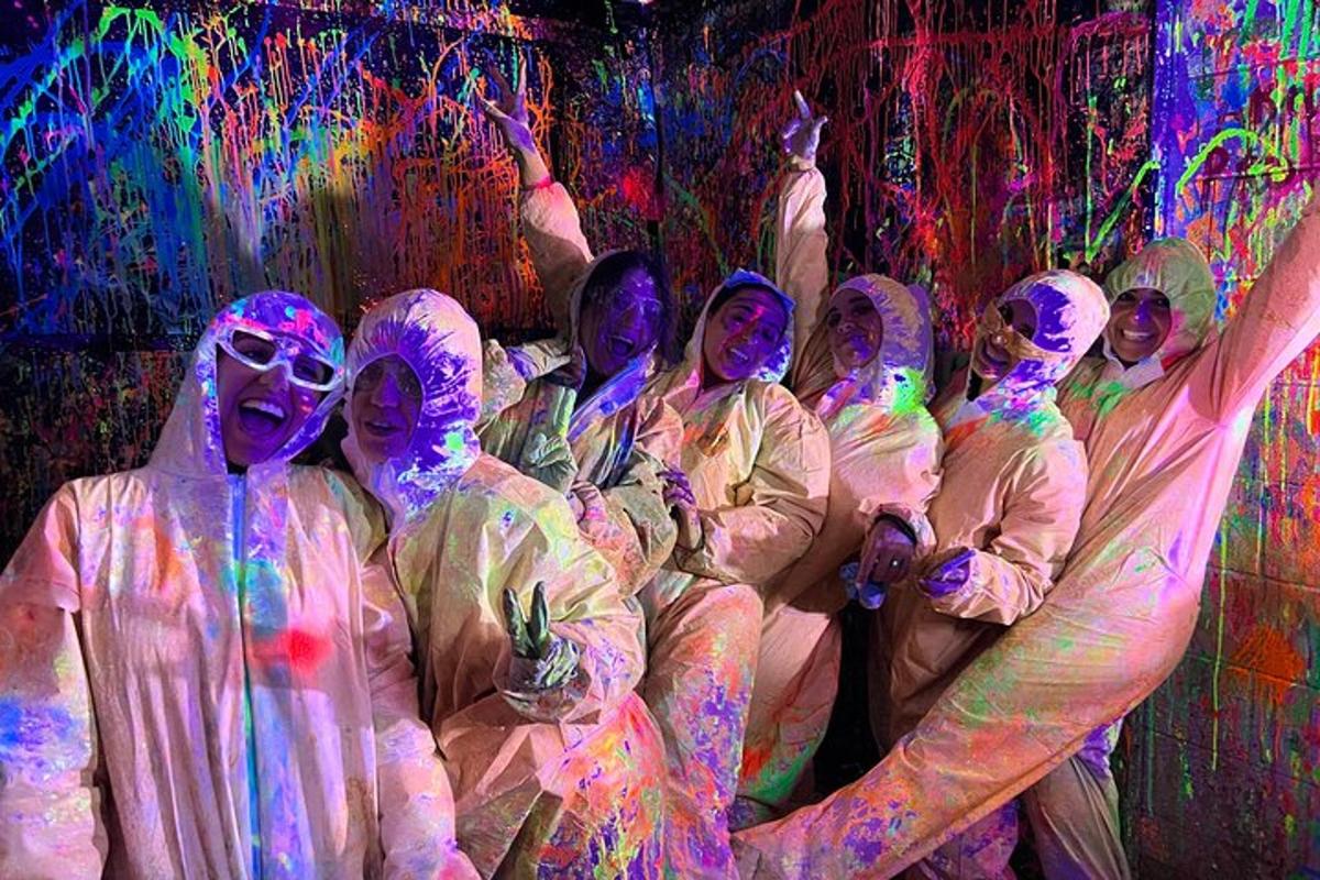 a group of people covered in paint posing for a picture