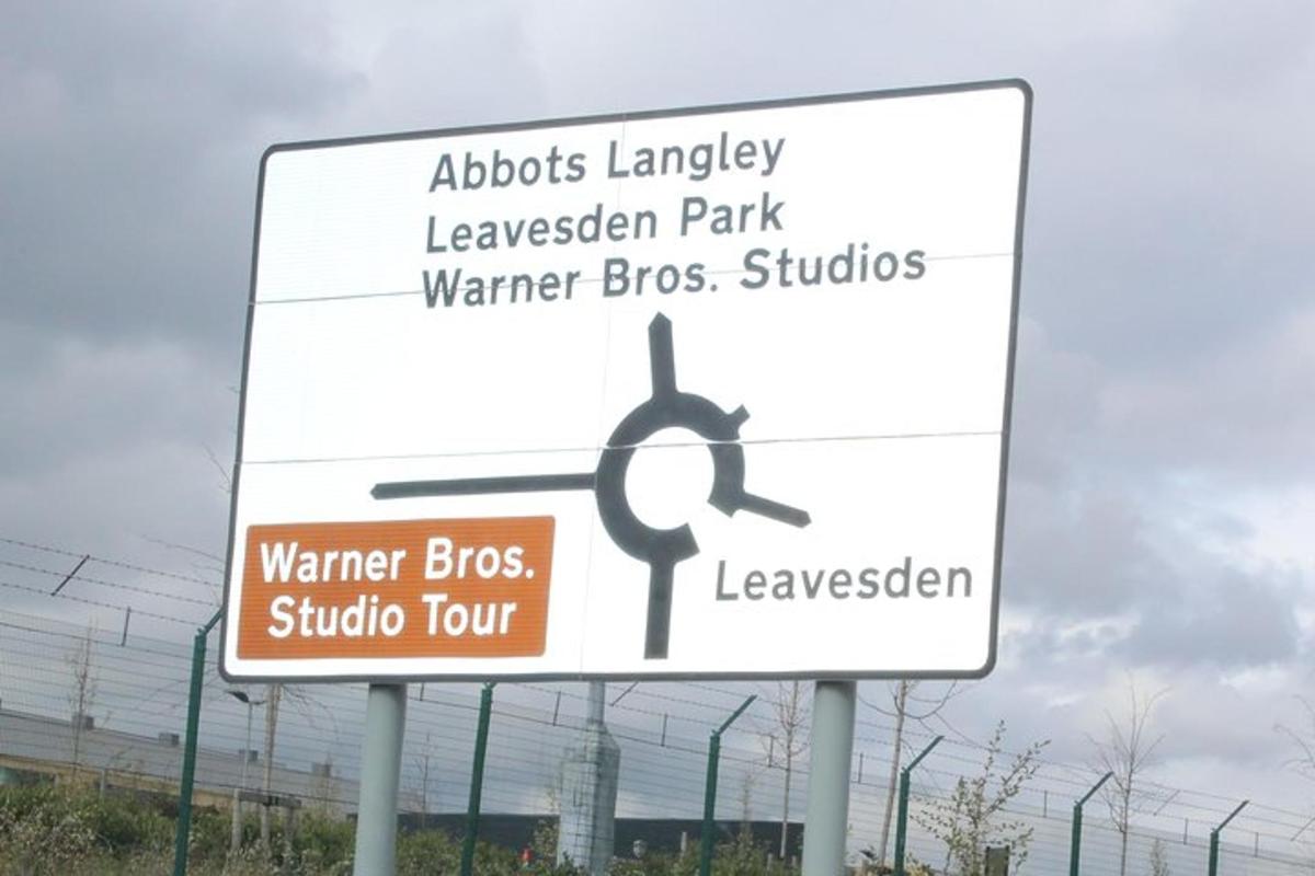 a sign on the side of a road