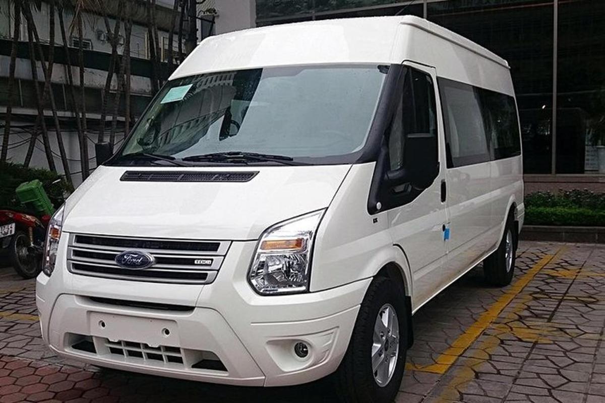 a white van is parked on a street
