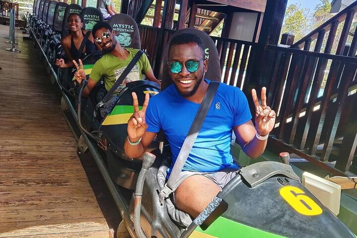 a man is sitting on a roller coaster