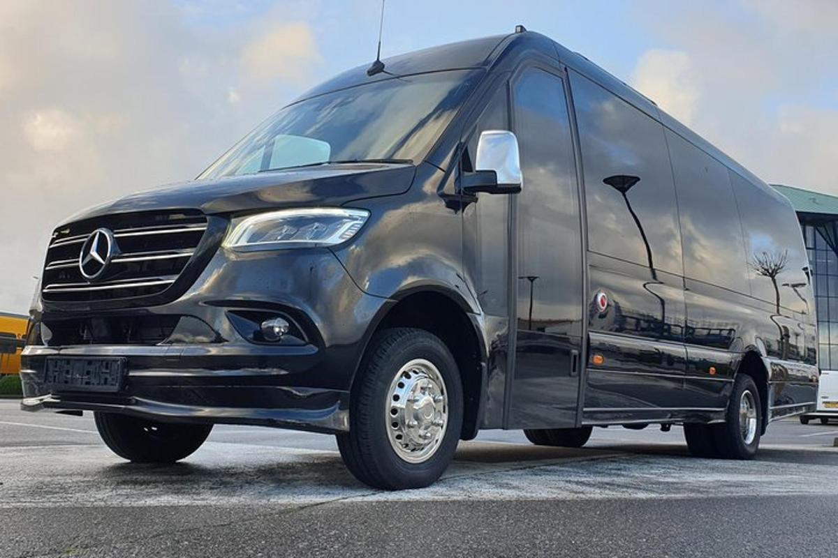 a black van parked in a parking lot