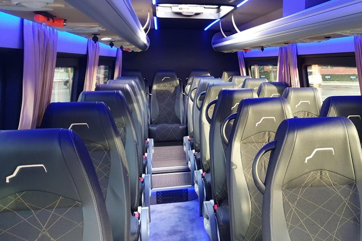 an empty bus with empty seats on a bus
