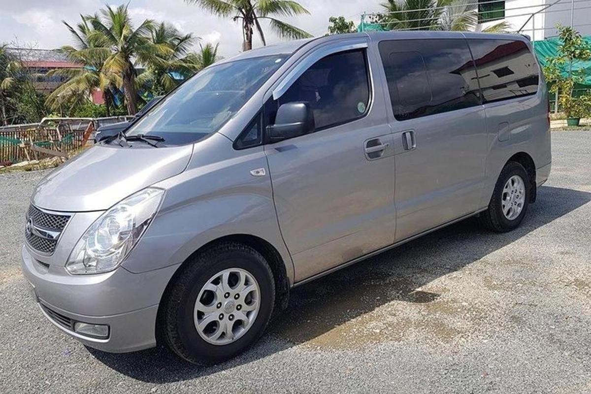 a silver van parked in a parking lot