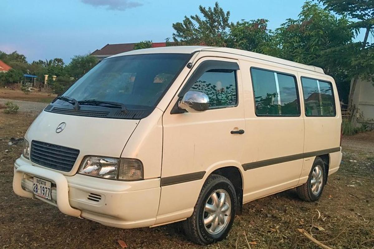 a white van parked in a field