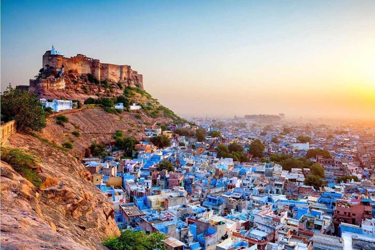 a view of the blue city of chefchaouen with a castle