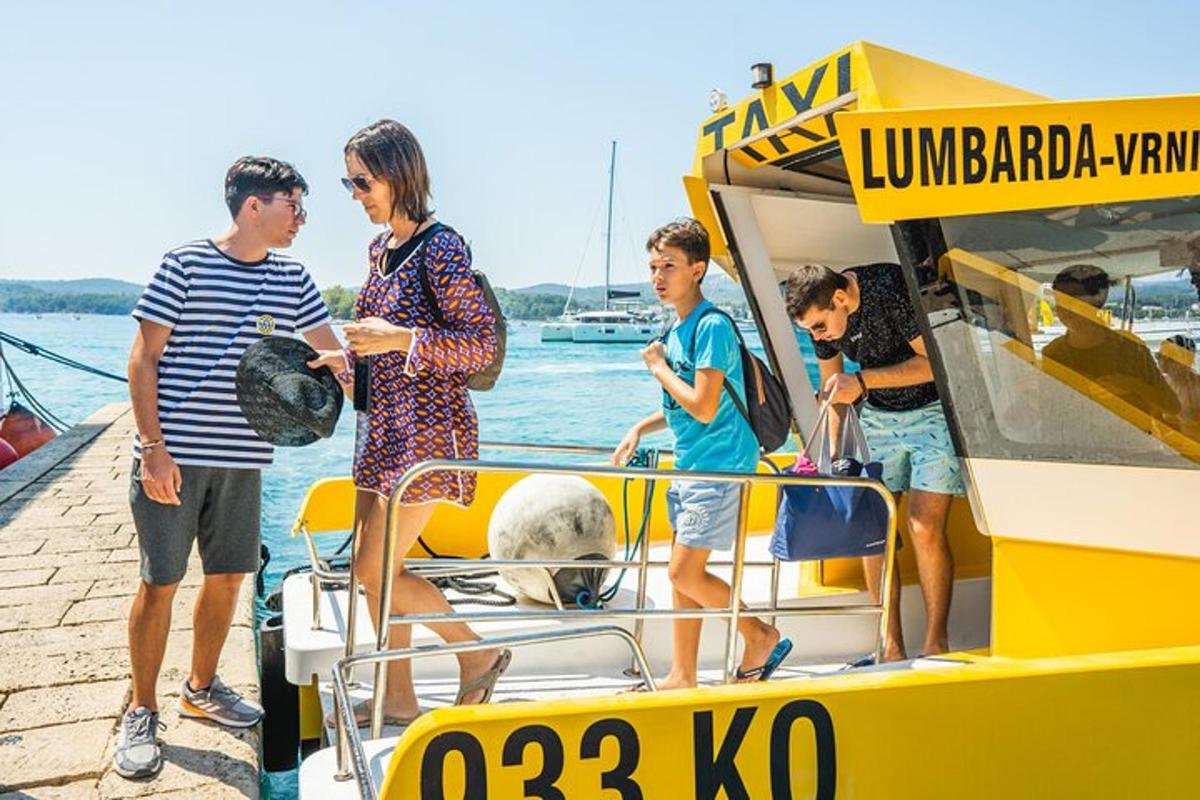 a group of people standing on a boat