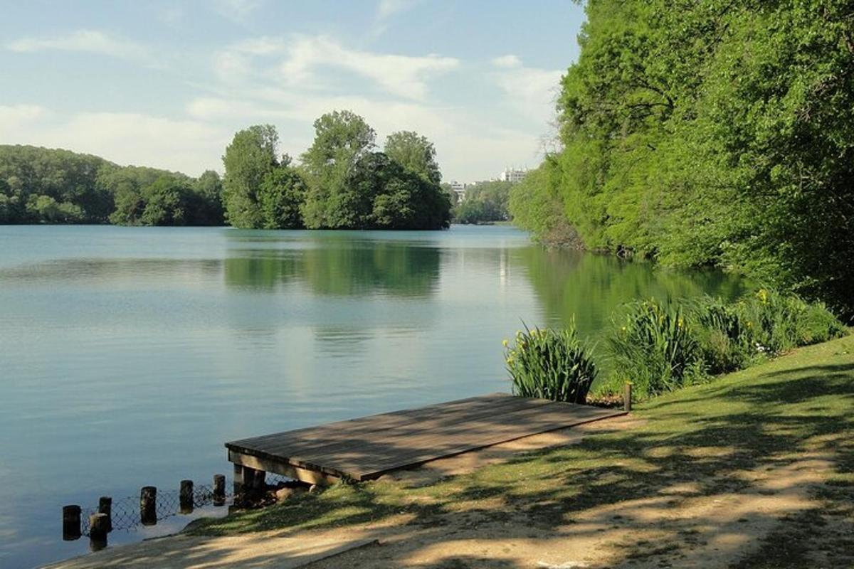 a lake with a dock on the side of it