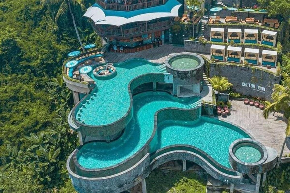 an aerial view of a water slide at a resort