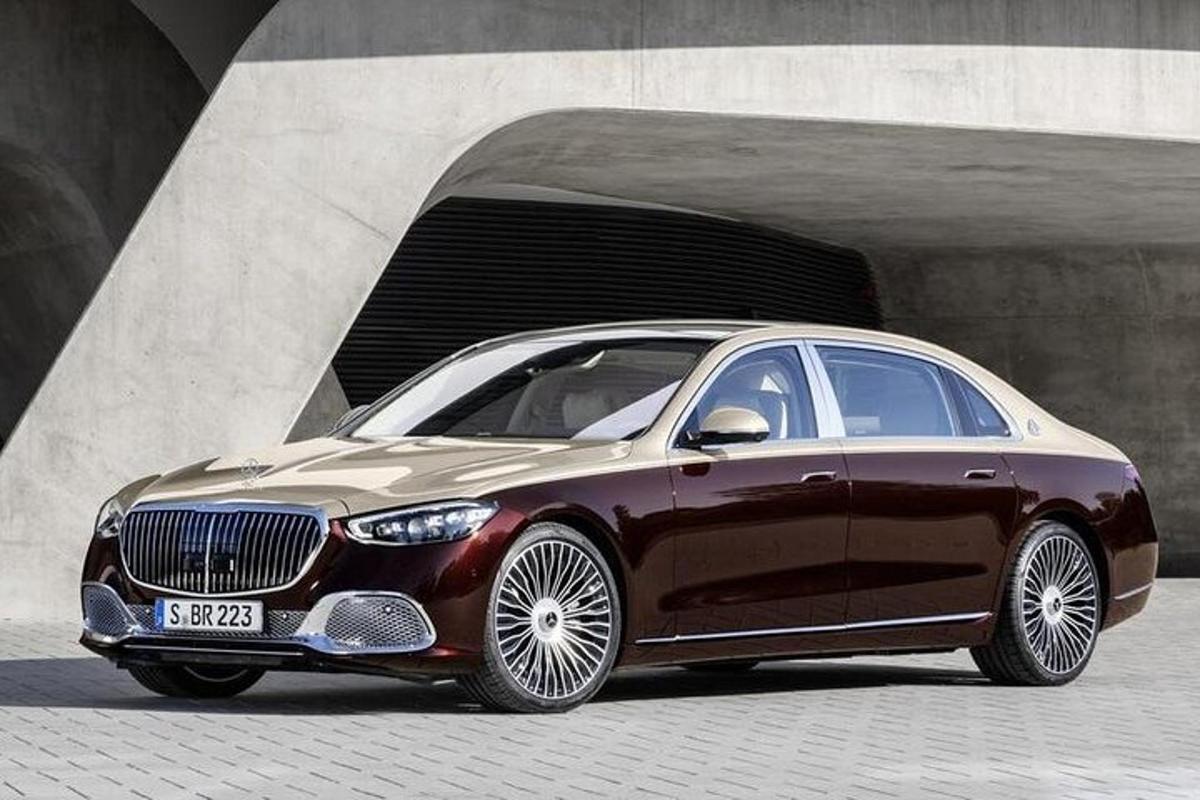 a brown bmw car parked in a tunnel