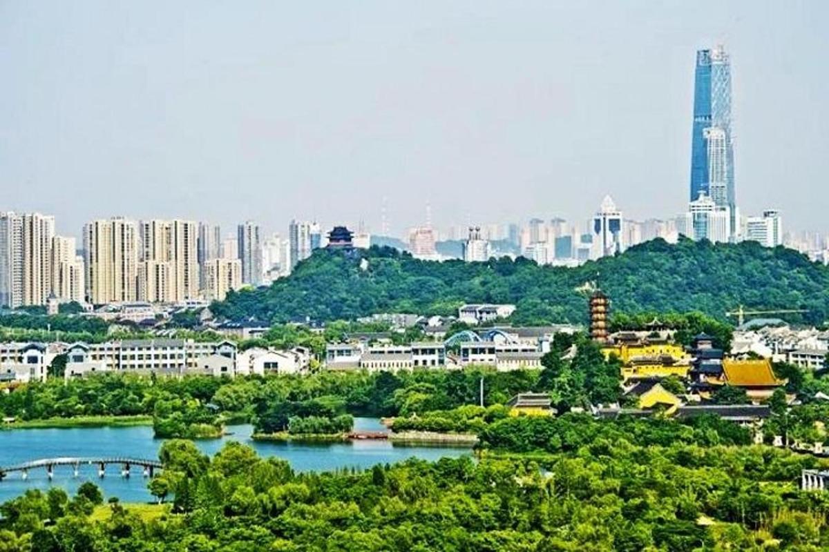 a view of a city with a river and buildings