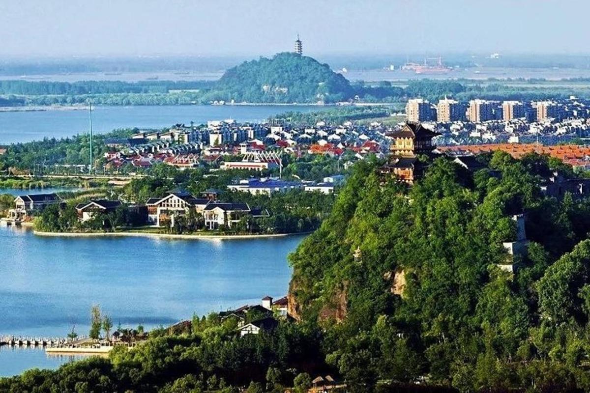 a view of a city on a river with buildings