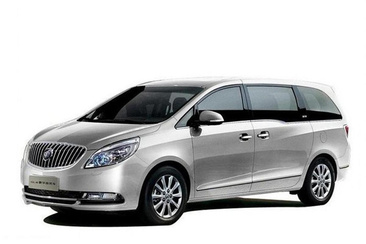 a silver car is parked on a white background