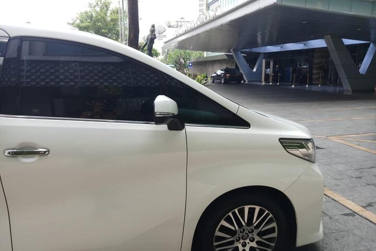 a white car parked in a parking lot