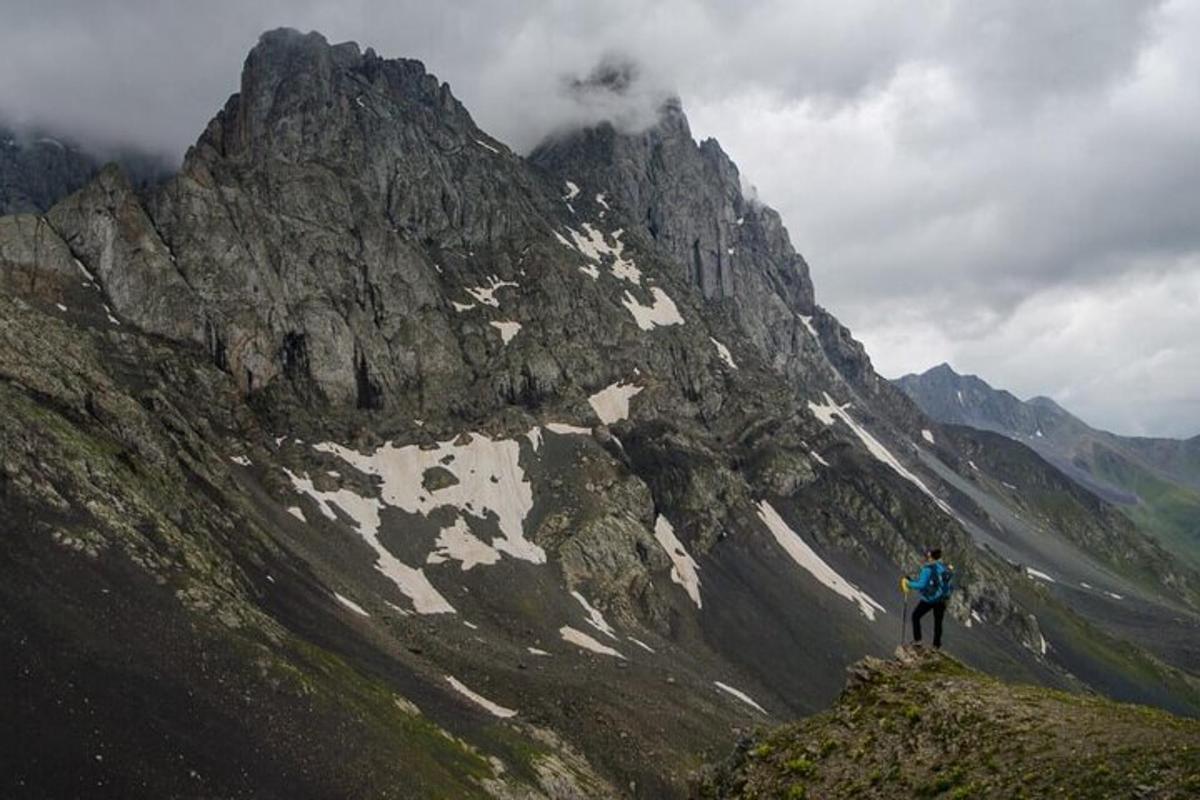 a man standing on top of a mountain