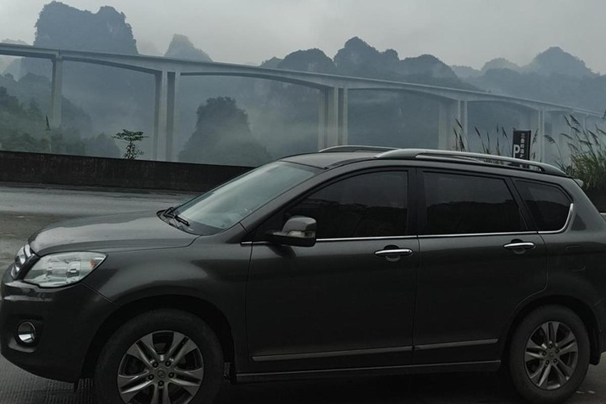 a black suv parked in a parking lot
