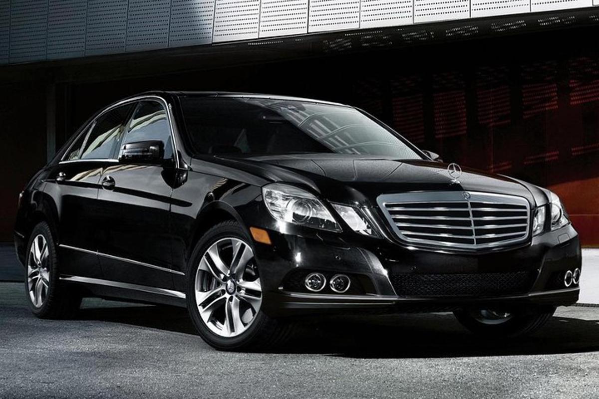 a black car parked in a parking lot
