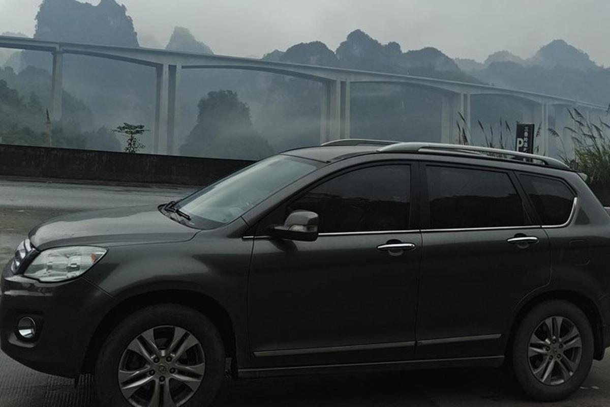 a black suv parked in a parking lot