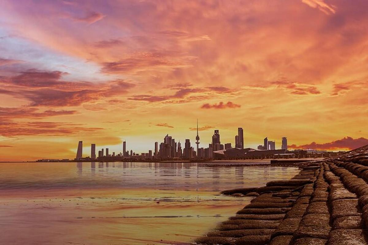a painting of a city skyline with the water