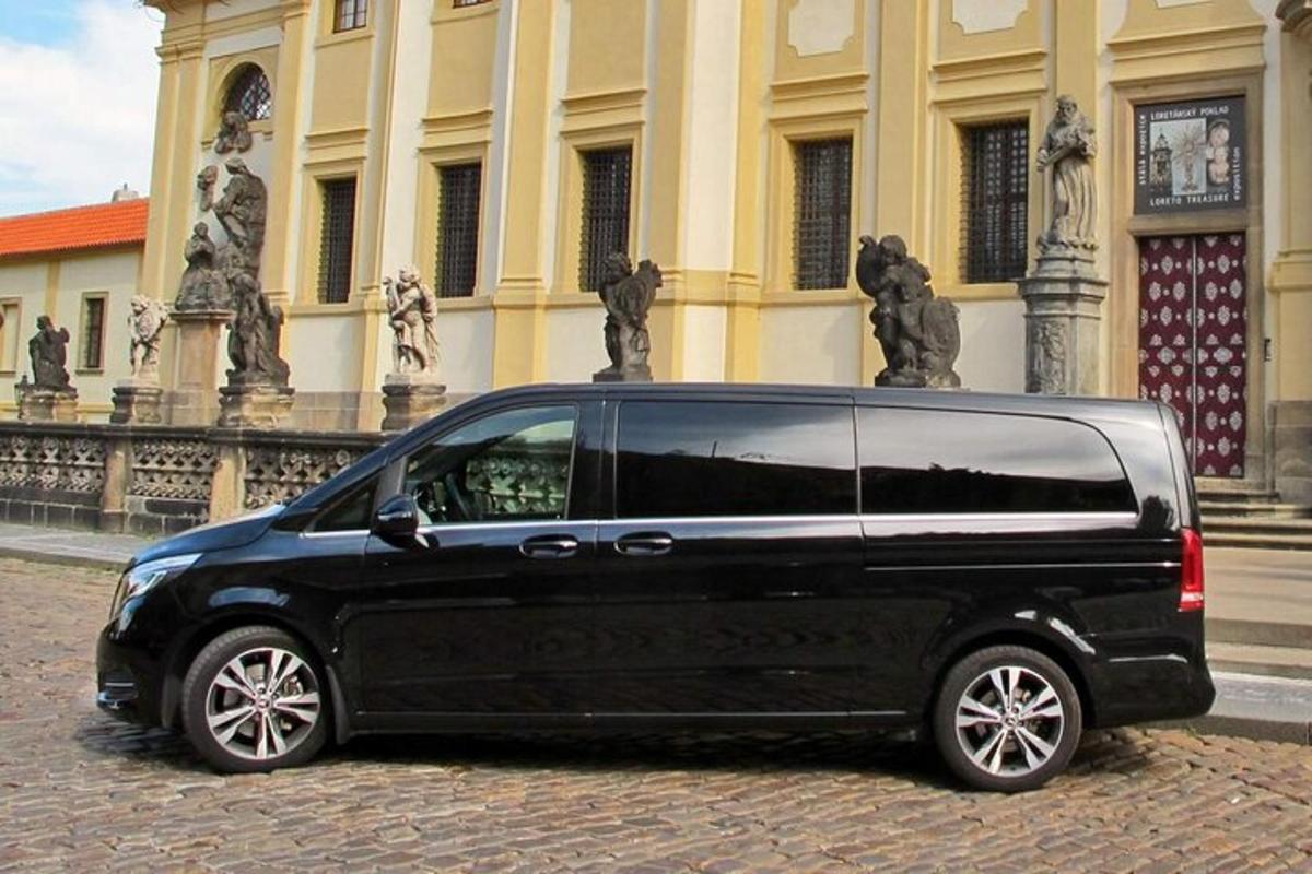 a black van parked in front of a building