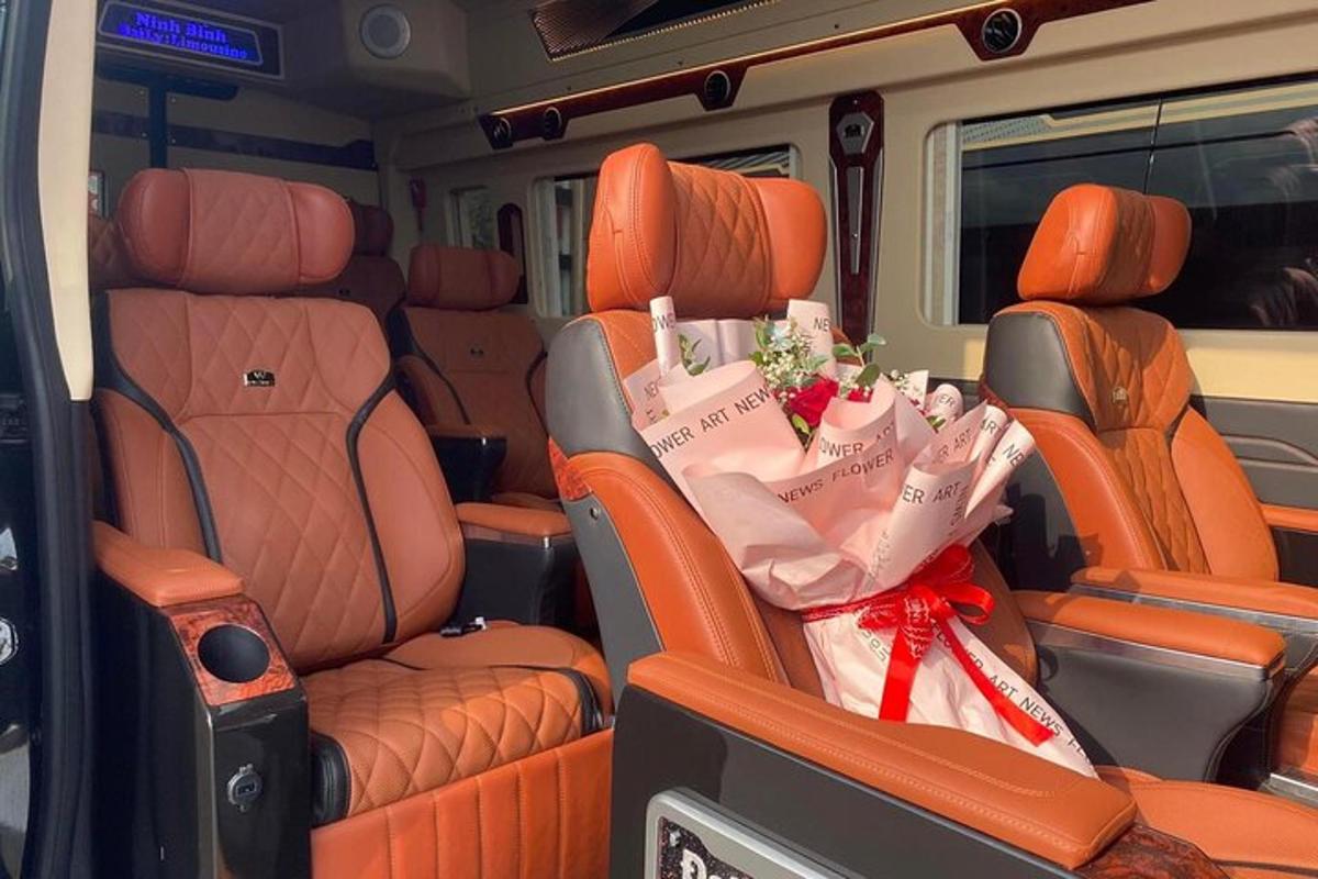 an interior view of a van with orange seats