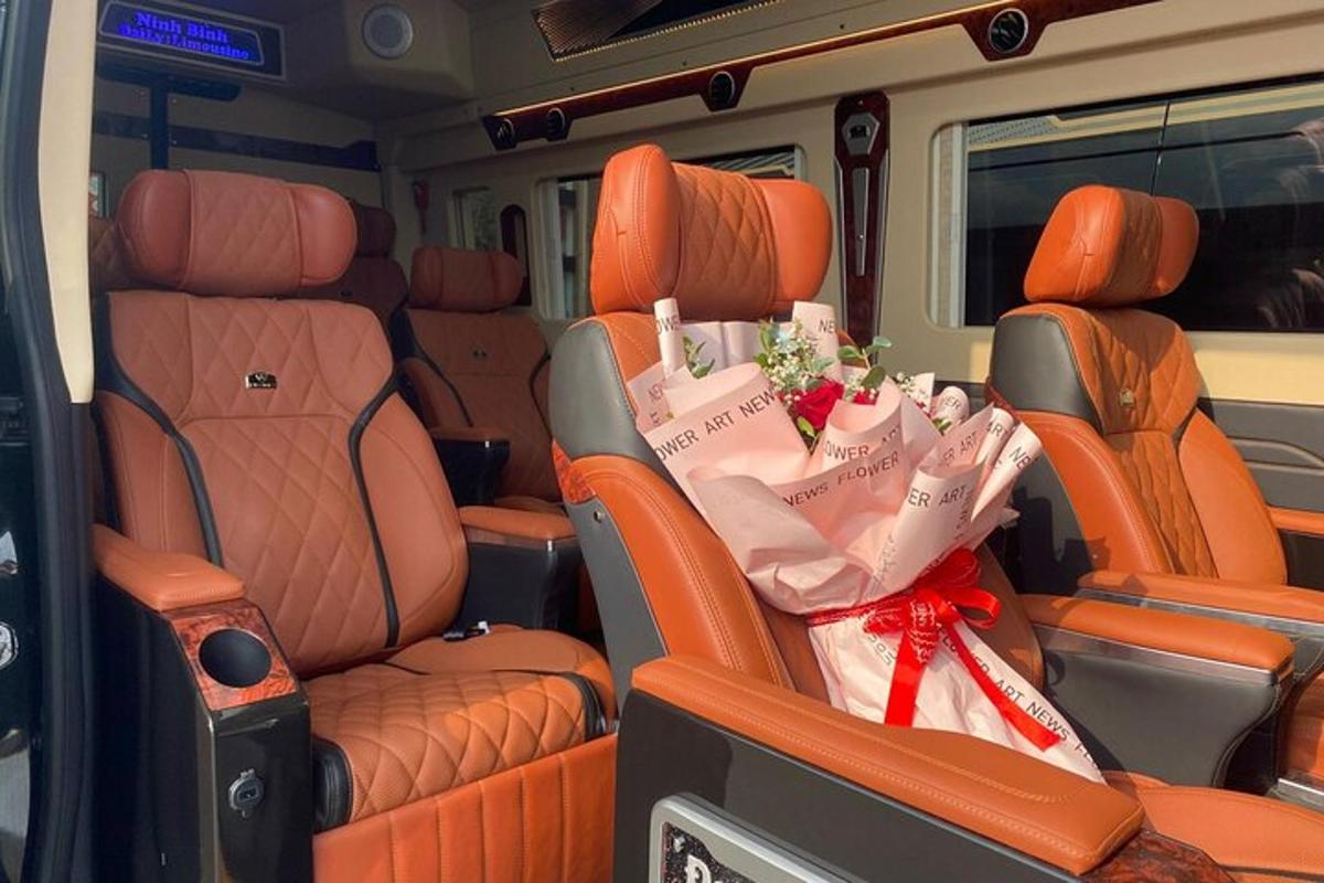 an inside view of a van with orange seats