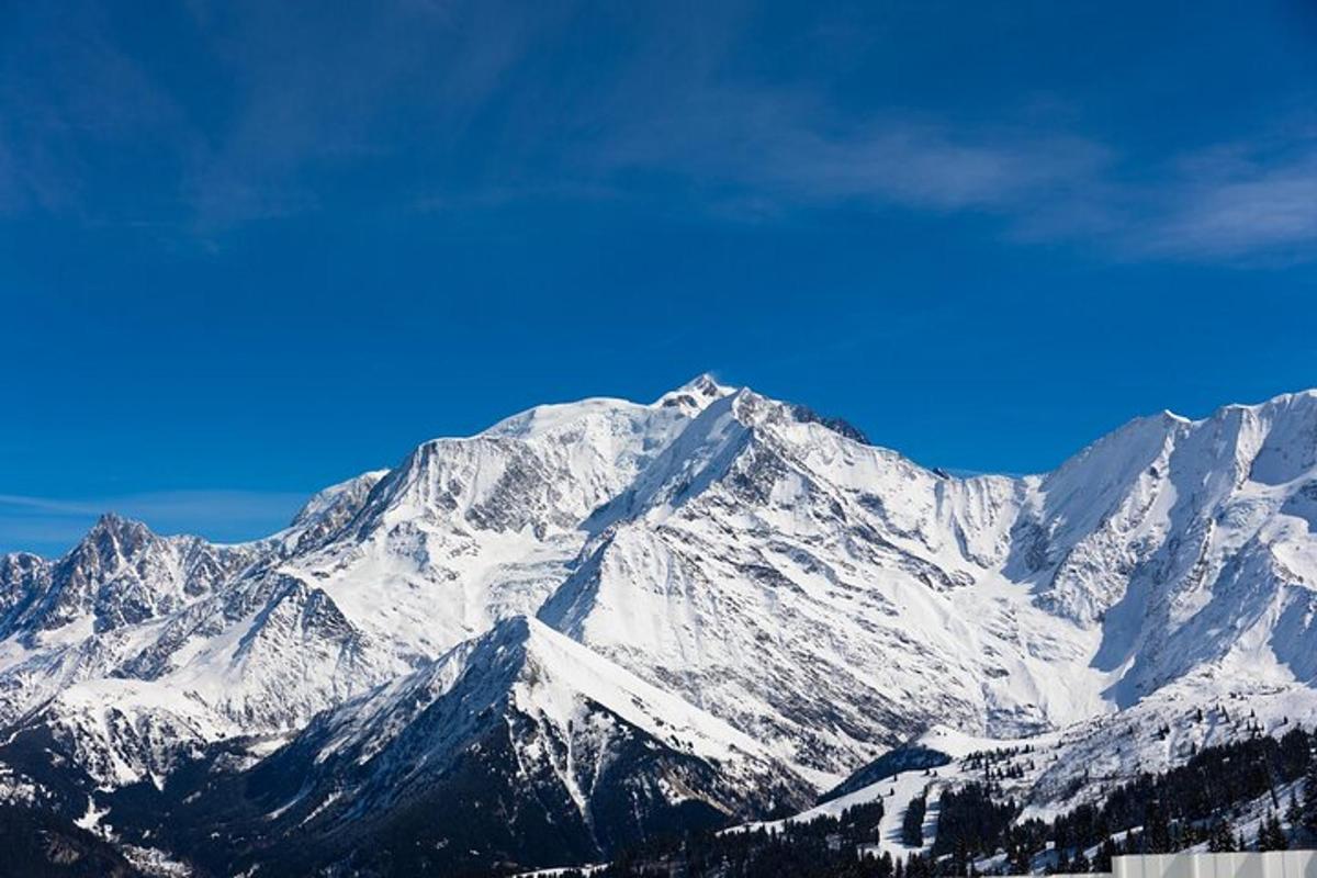 a mountain covered in snow on top