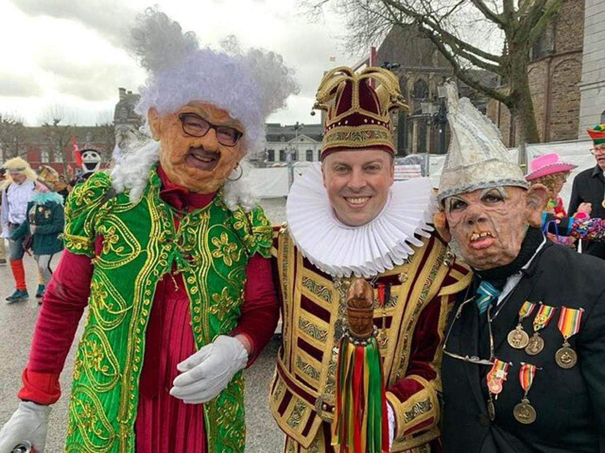 a group of three people dressed up in costumes