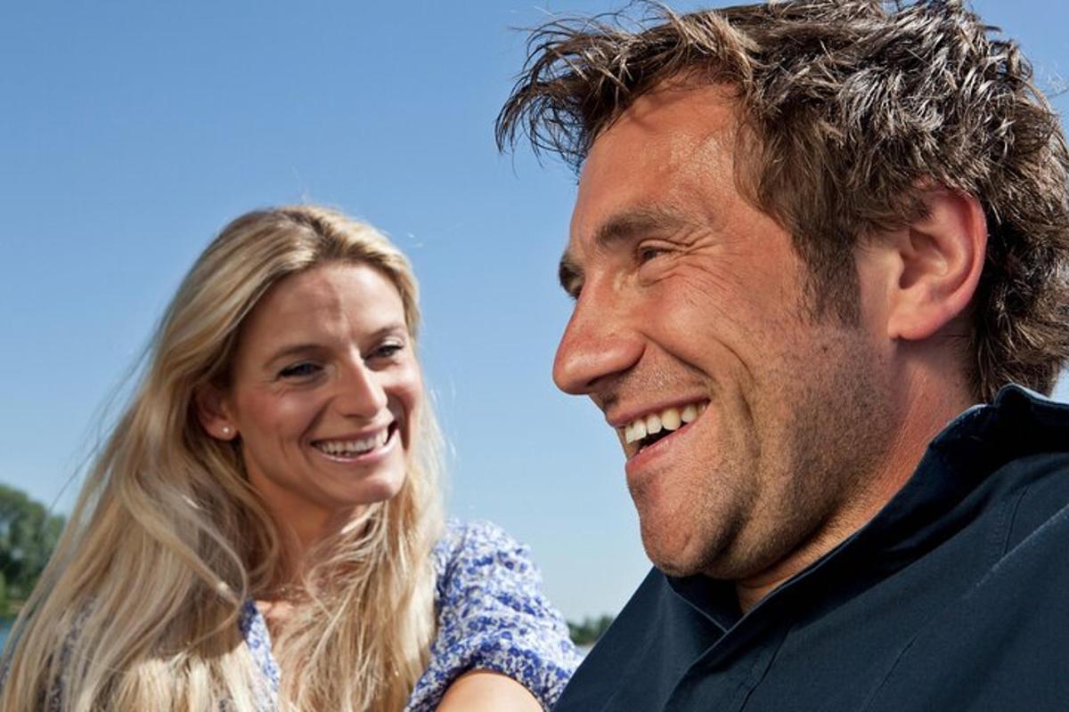 a man and a woman are smiling together