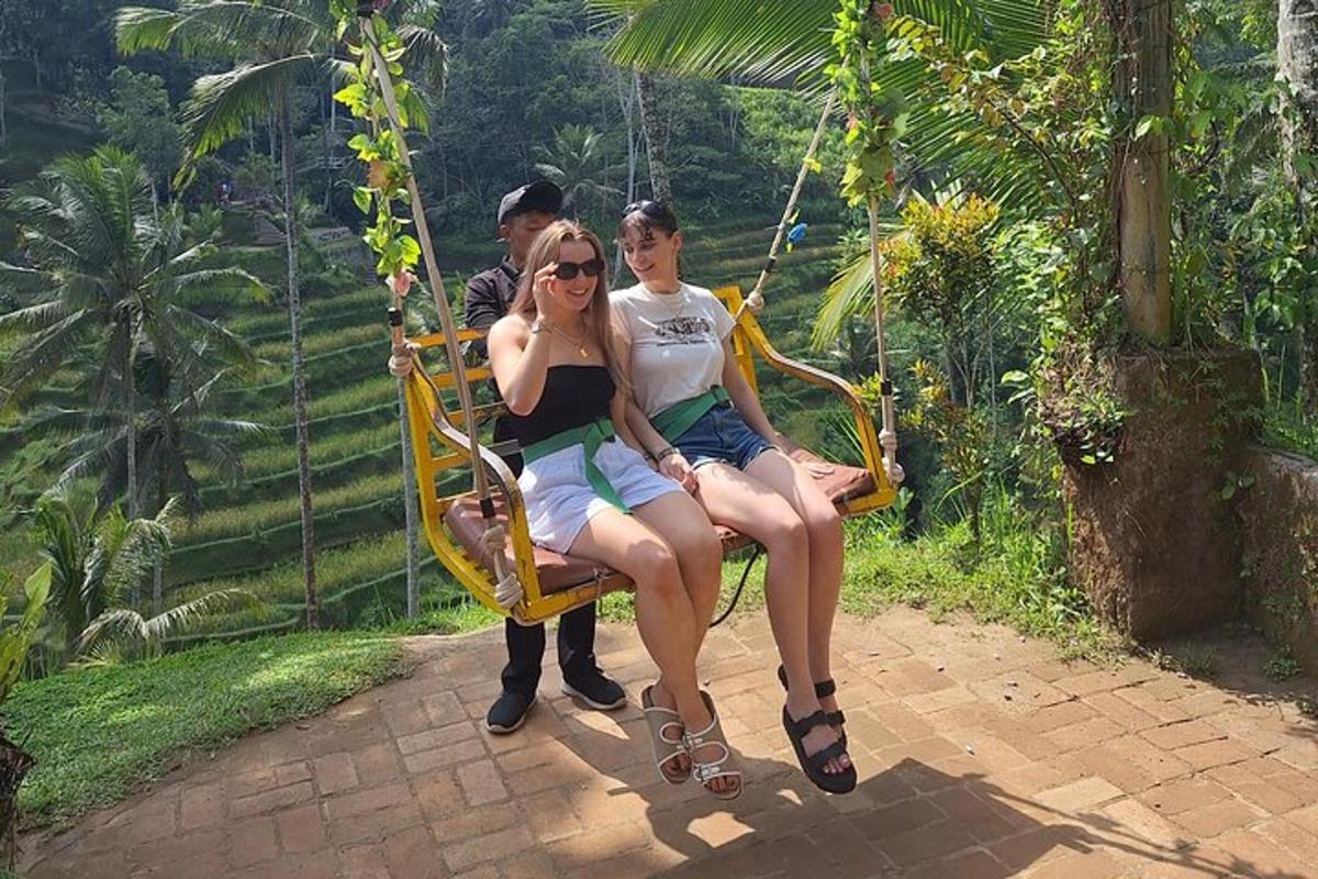 a group of three people sitting on a swing