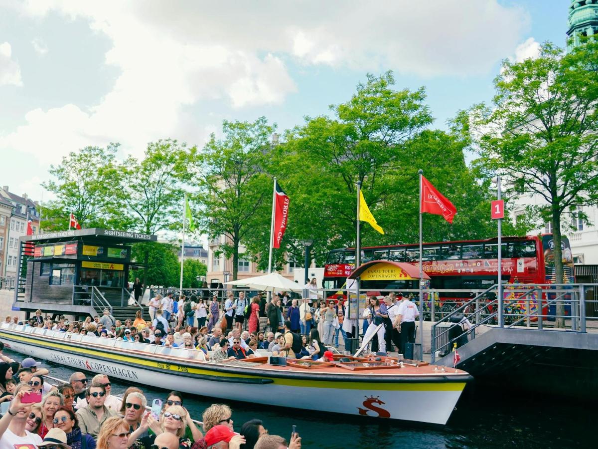 a group of people on a boat in the water