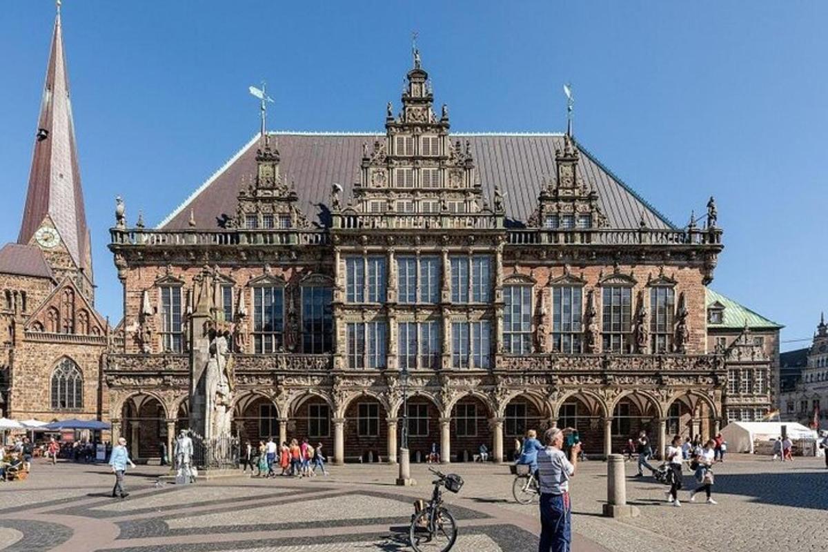 a large building with people standing in front of it