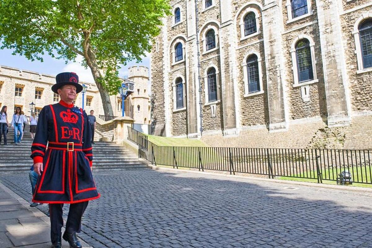 a man in a uniform standing in front of a building
