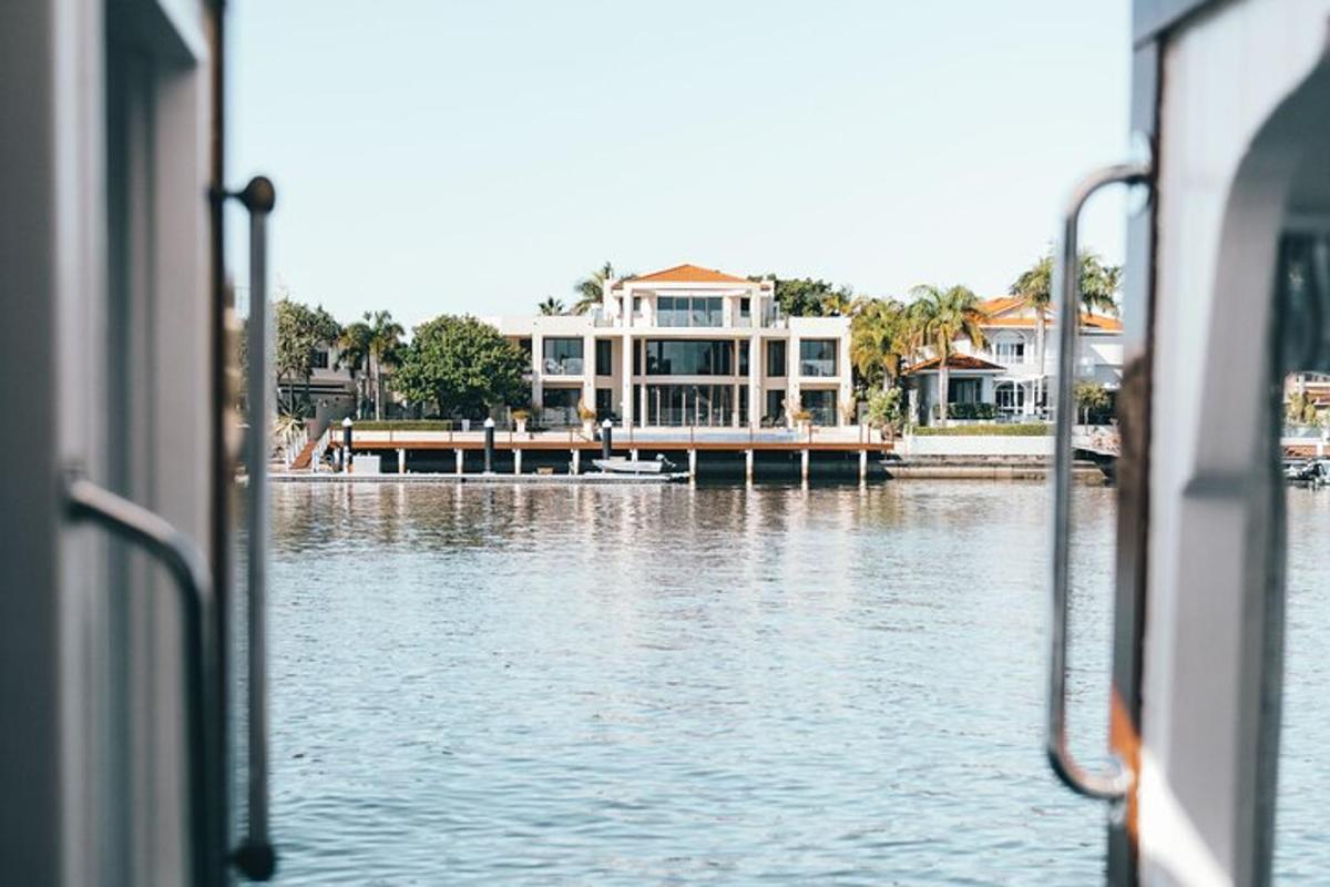 a view of a house from a boat in the water