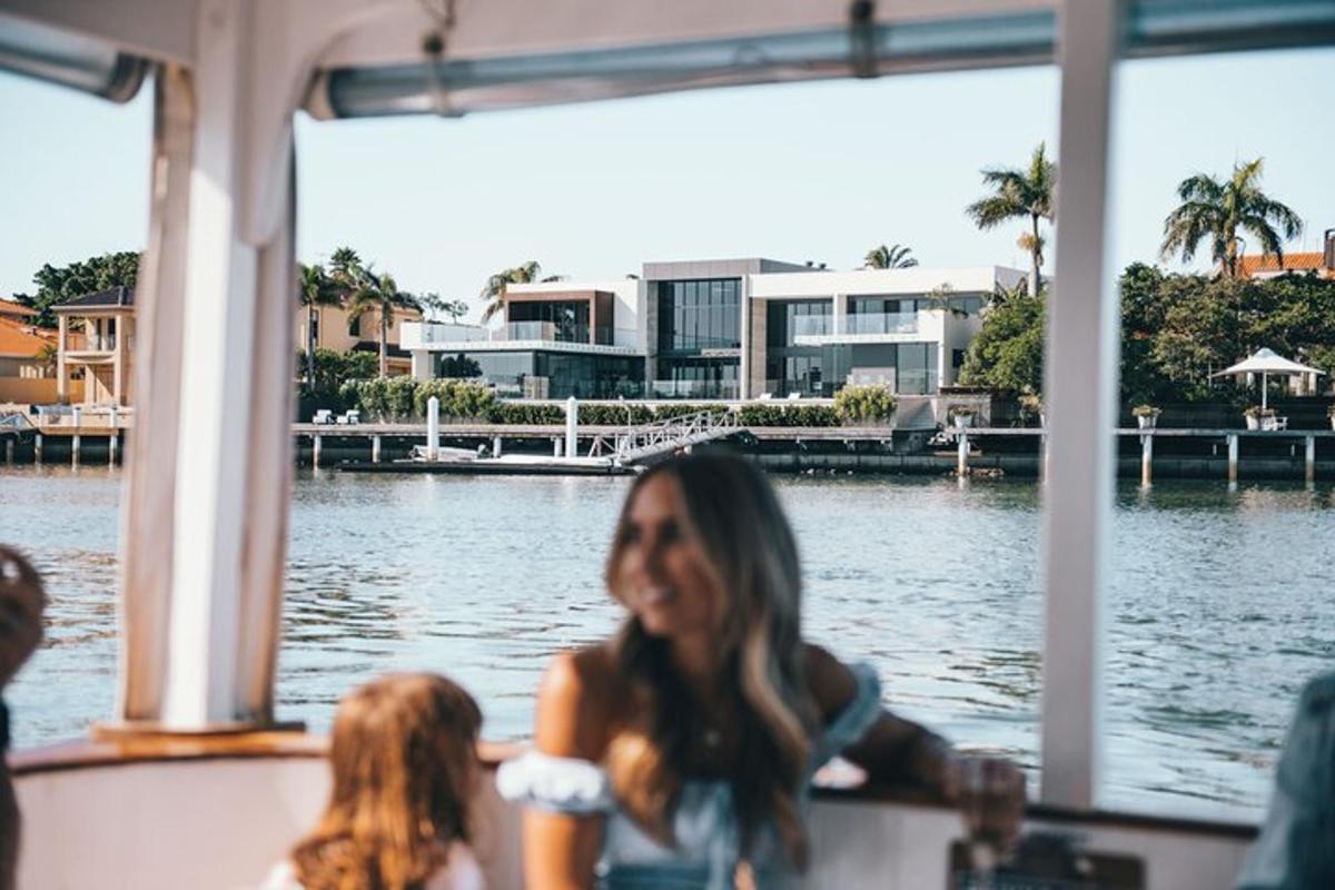 a woman and a girl on a boat in the water
