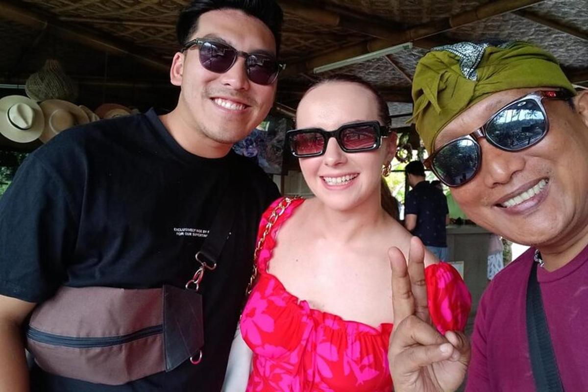 a man and two women posing for a picture