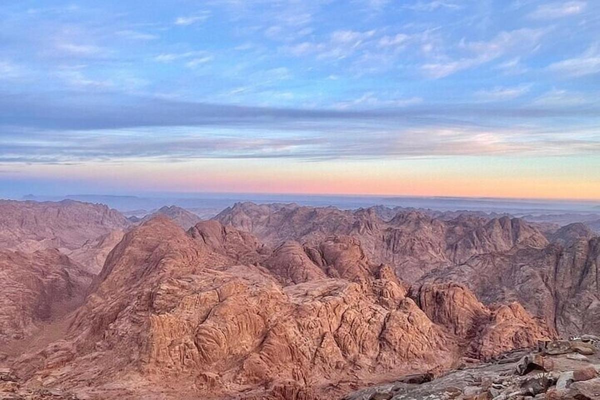 a view of a mountain range with the sky