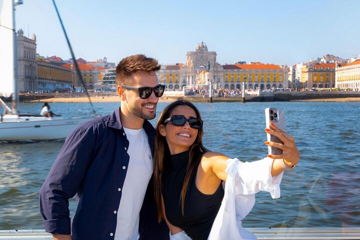 a man and a woman taking a picture on a boat