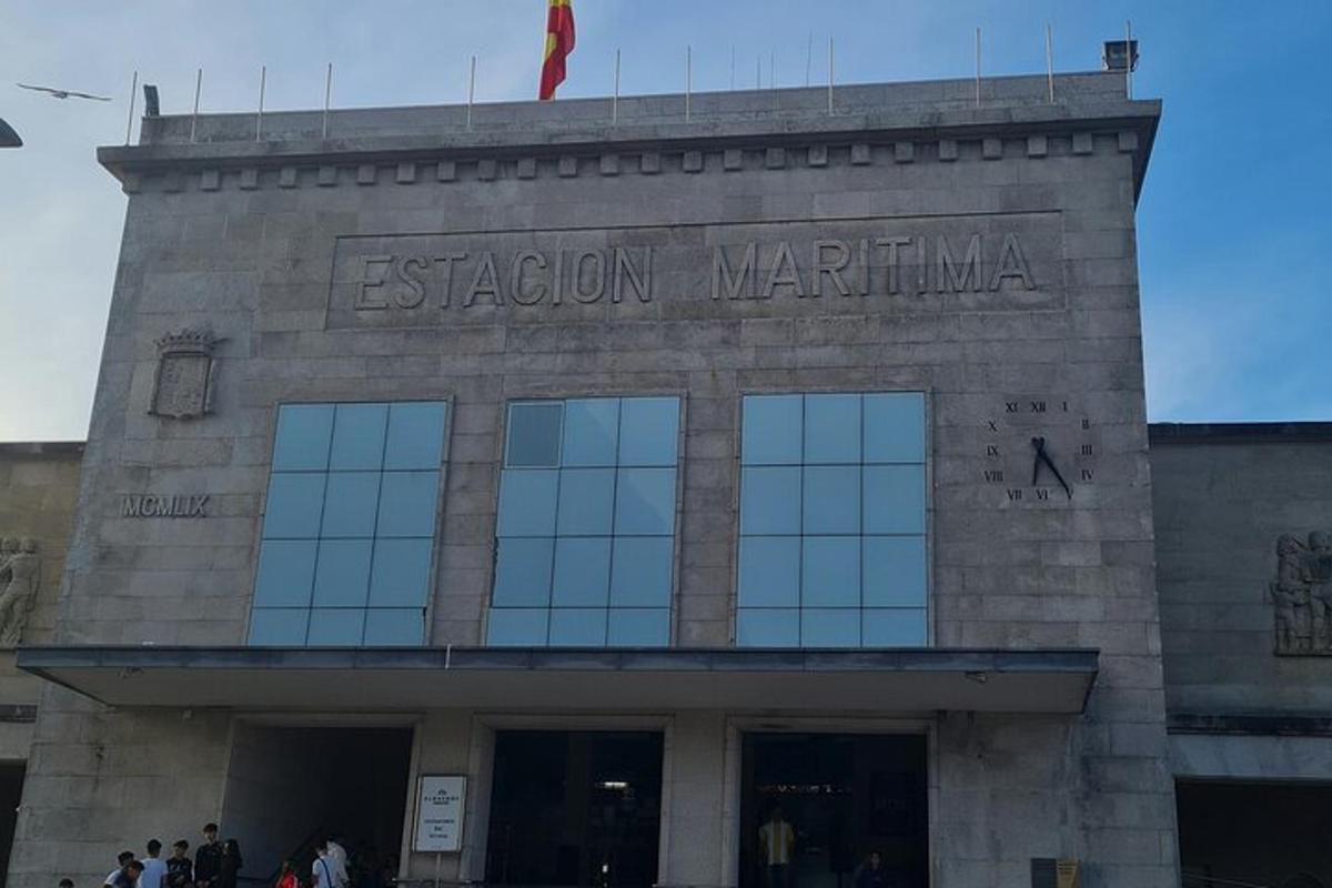 a large stone building with a sign on it