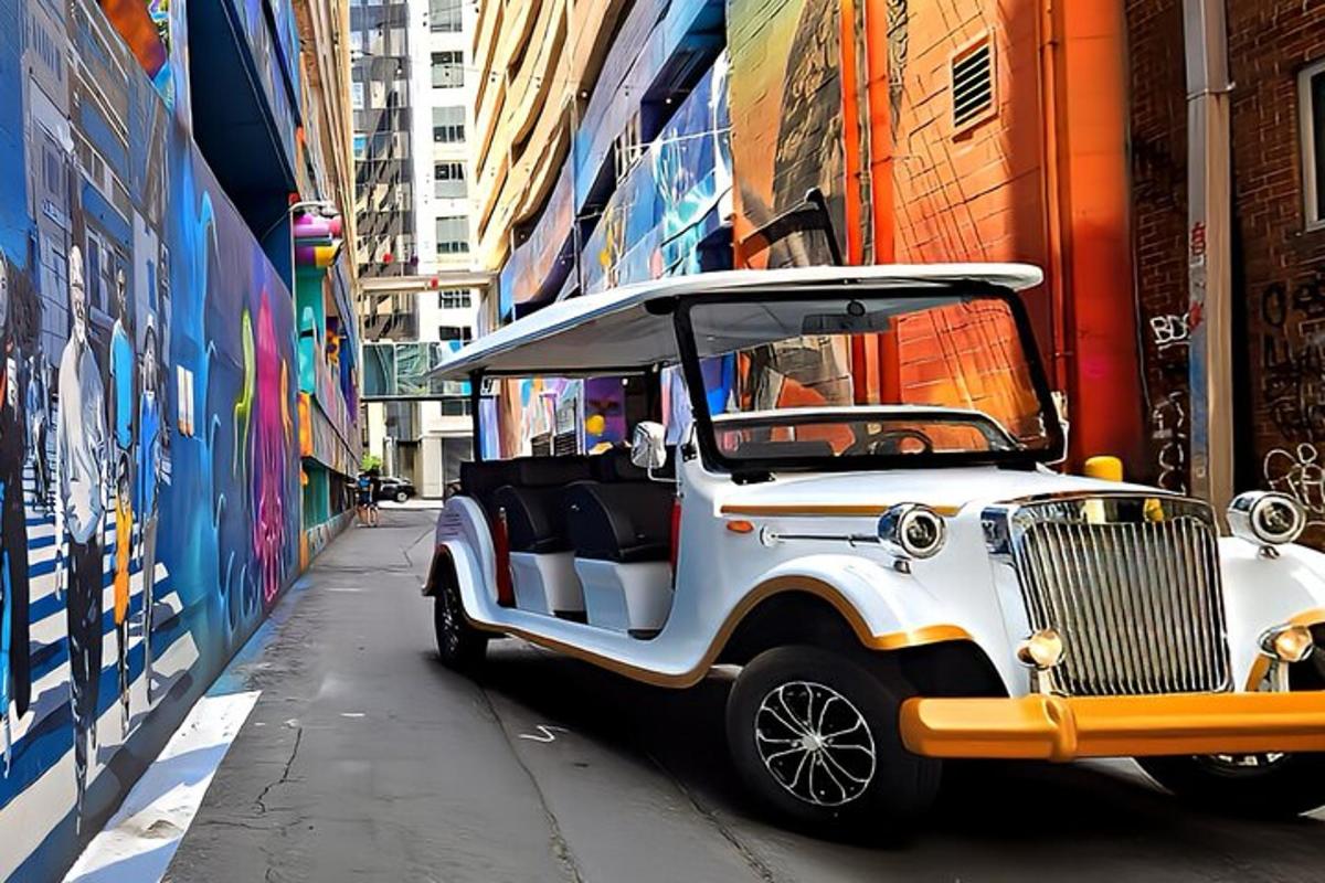 a white golf cart parked on a city street