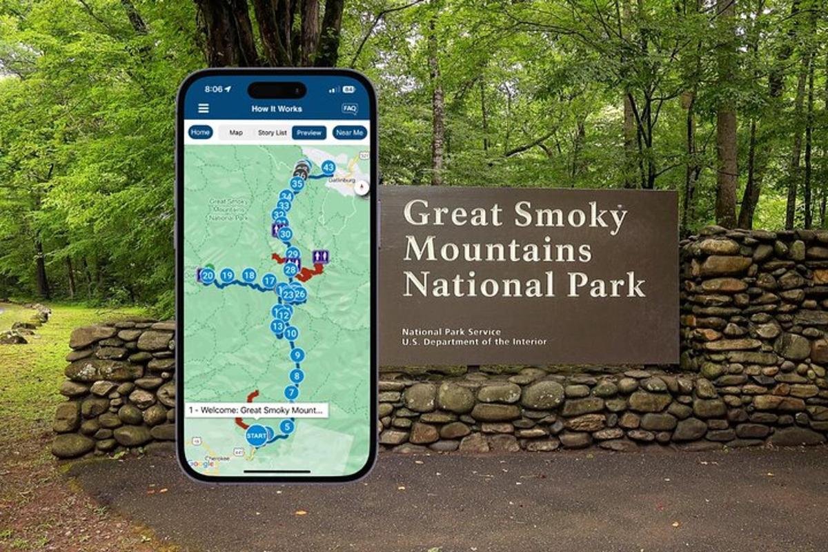 a cell phone sitting next to a sign with a map