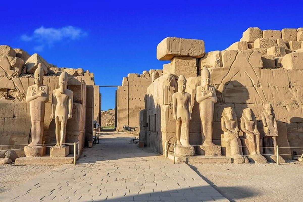 a group of statues in front of a building