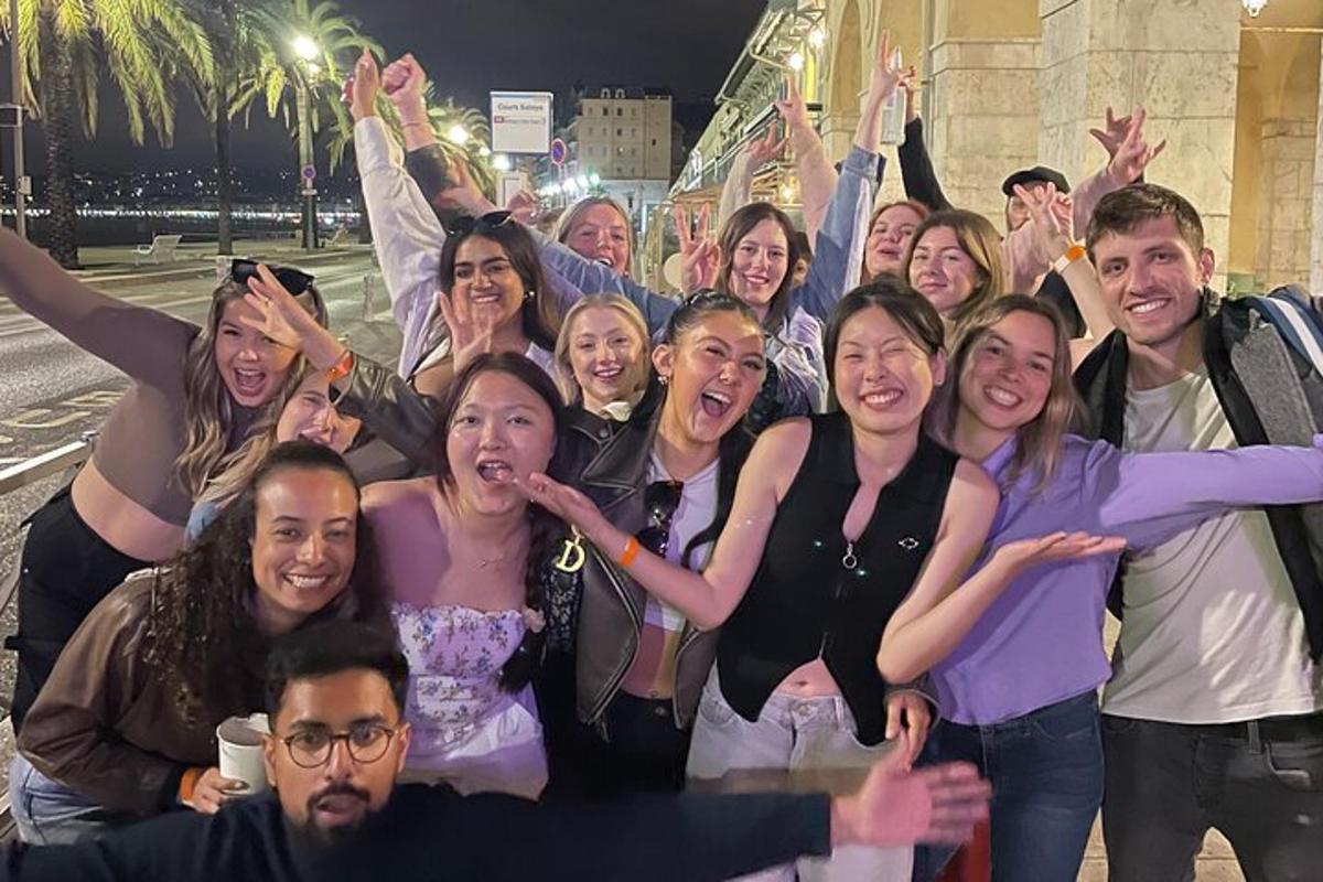 a group of people are posing for a picture